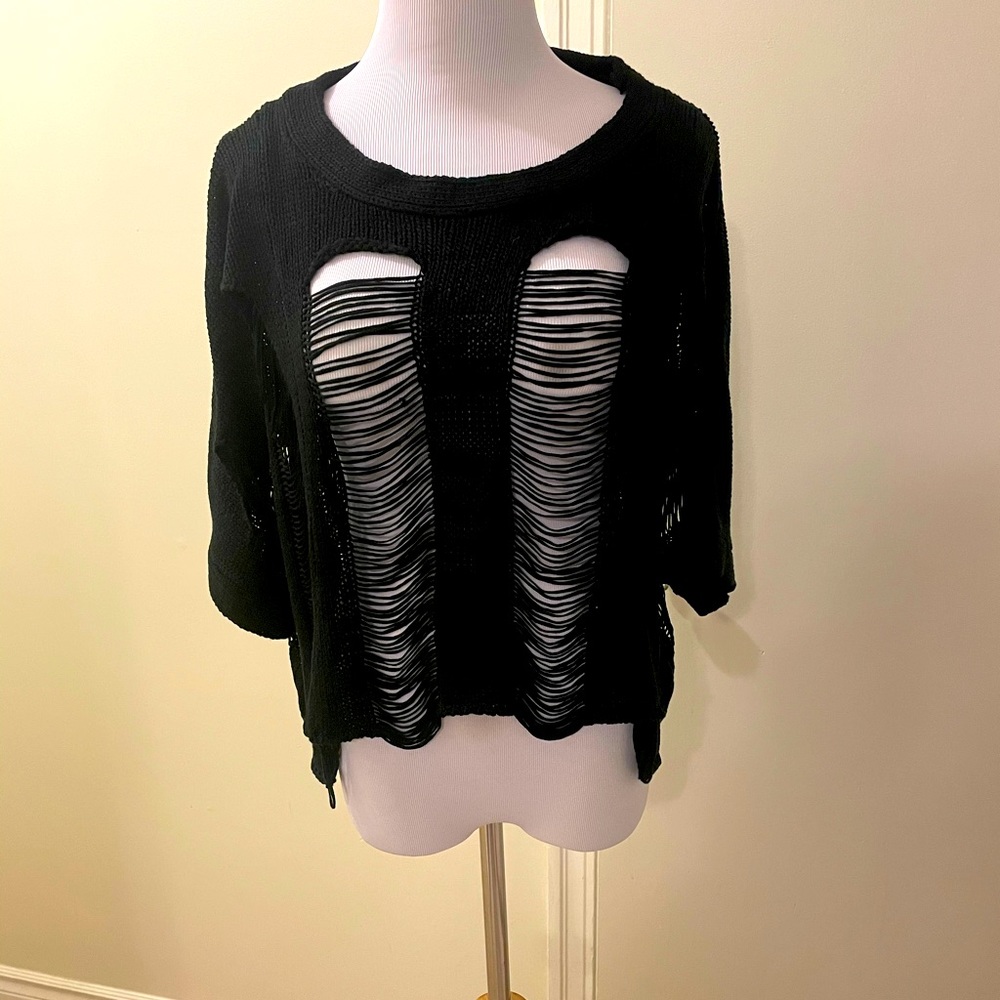Distressed oversized sweater